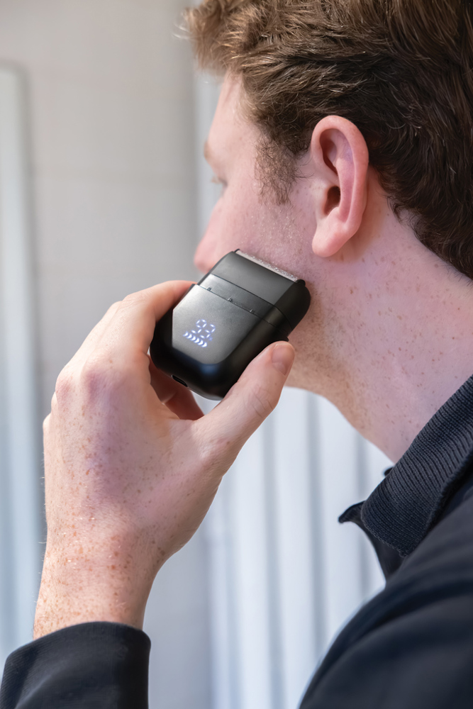 TrimBlade wiederaufladbarer IPX7 Reise-Rasierer